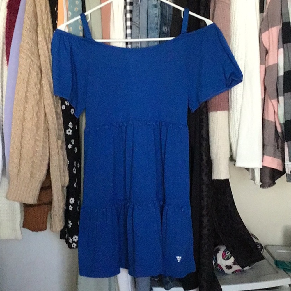 Blue dress with pom-poms